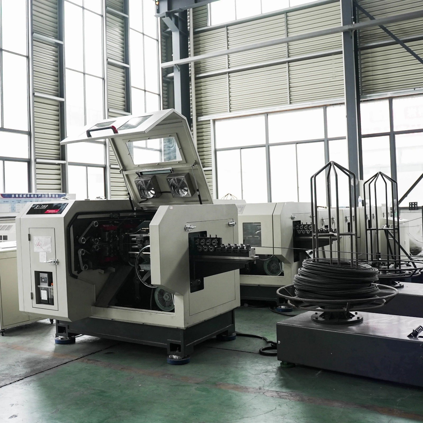 UNITE DE FABRICATION AUTOMATIQUE DE CLOUS